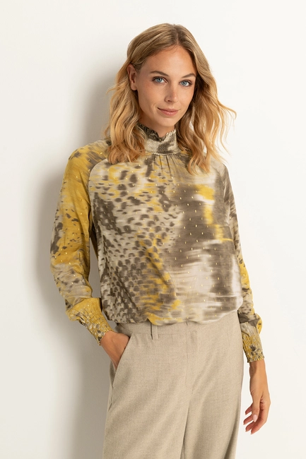 Abstracte blouse met goudaccenten