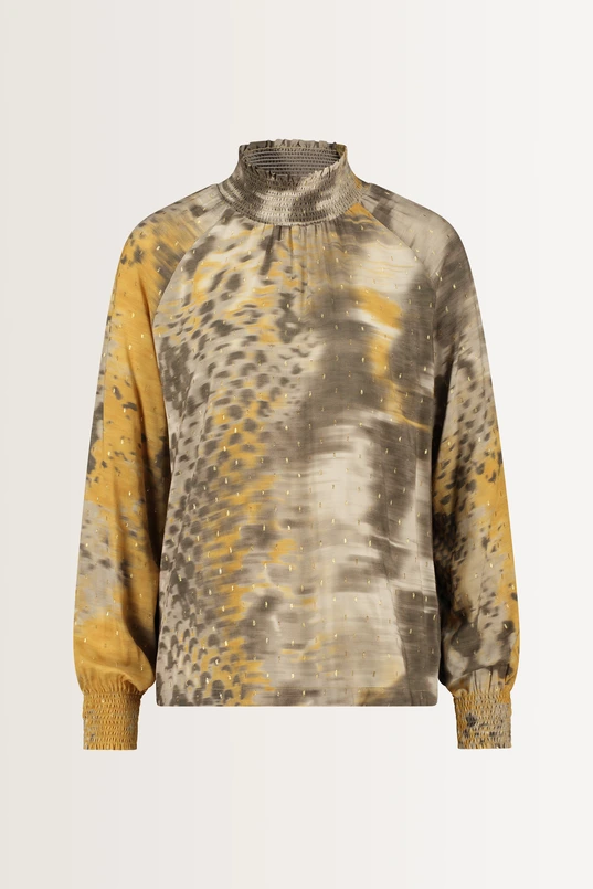 Abstracte blouse met goudaccenten