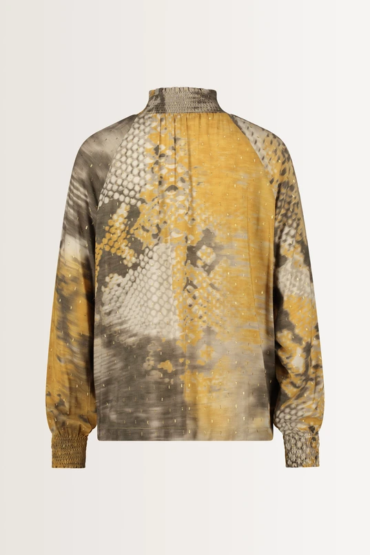 Abstracte blouse met goudaccenten
