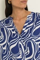 Blouse met swirlprint