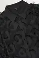 Blouse met veertjes