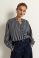 Blouse met wisselende streeprichting