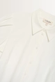 Blouse travelstof pofmouwen