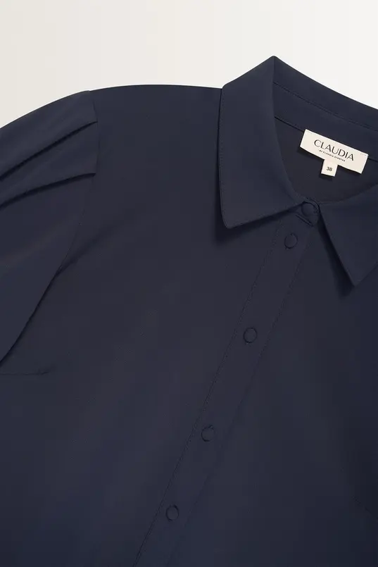 Blouse travelstof pofmouwen