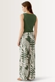 Broek met bladprint OUI