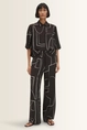 Broek met crêpestructuur Cevil graphic Someday