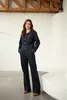 Denim chino met decoratief gespje