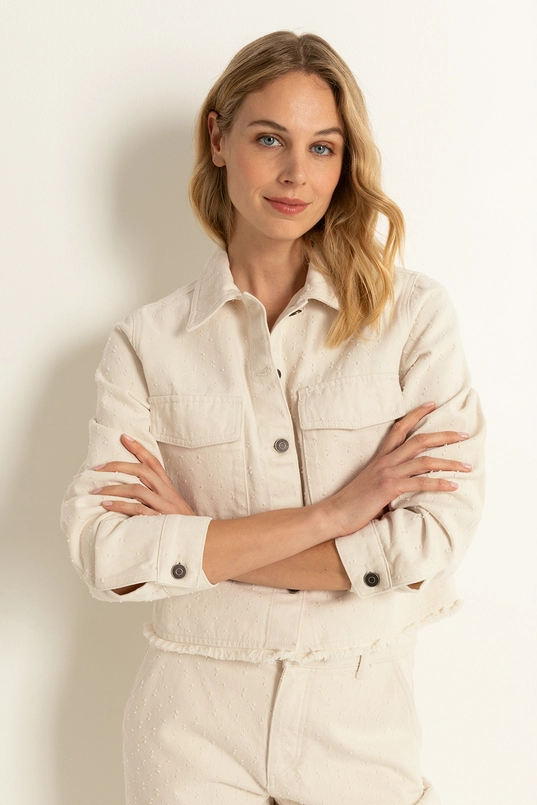 Denim jasje met dotstructuur