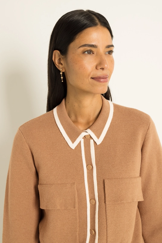 Gebreid vest met contrasterende bies