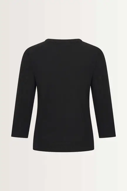 Knitted top in an open jacquard stitch