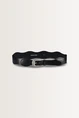 Leren riem met golvend patroon