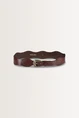 Leren riem met golvend patroon
