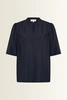 Licht glanzende blouse met V-hals