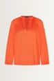 Losvallende blouse plooidetails