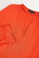 Losvallende blouse plooidetails