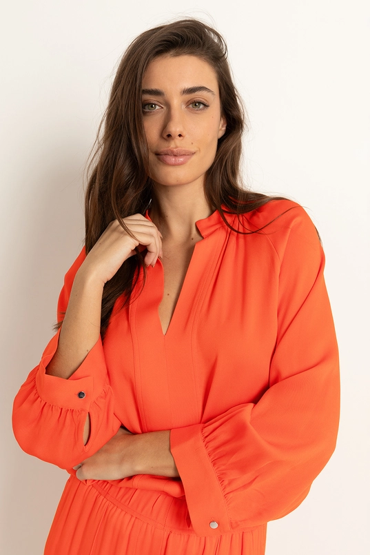 Losvallende blouse plooidetails