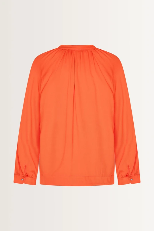 Losvallende blouse plooidetails
