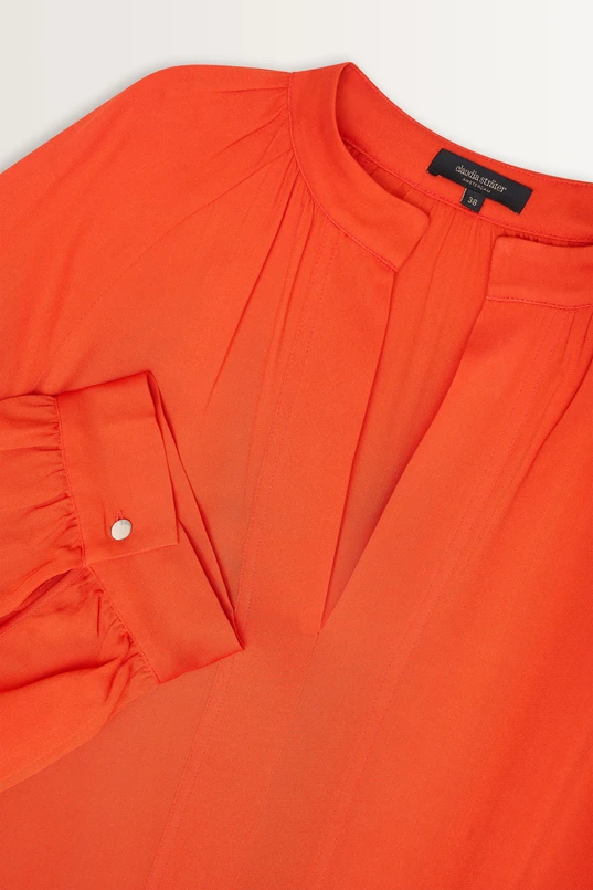 Losvallende blouse plooidetails