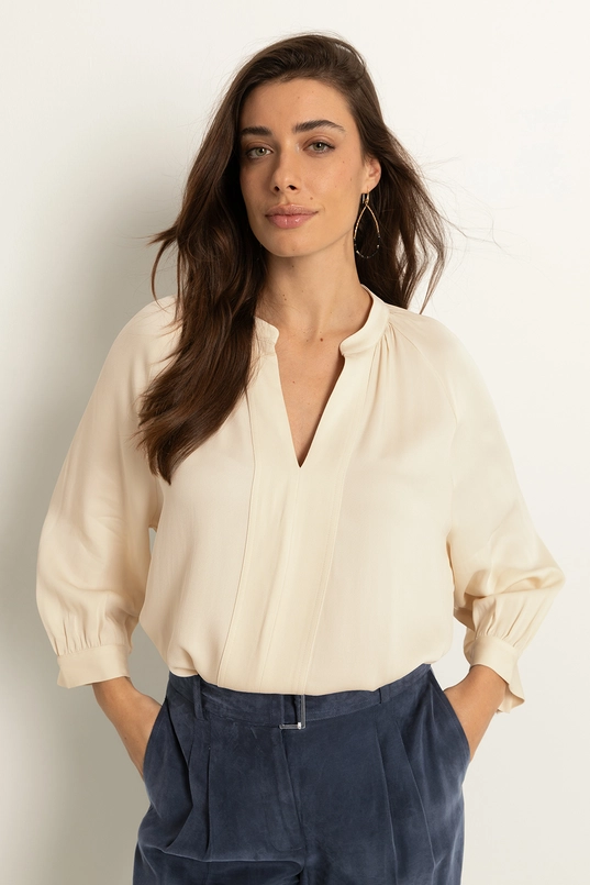 Losvallende blouse plooidetails