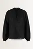 Luchtige blouse bladmotief