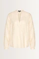 Luchtige blouse bladmotief