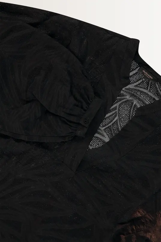 Luchtige blouse bladmotief