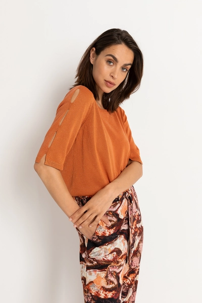 Lurex trui met mouwsplit