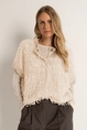 Mouwloos vest met ingebreide franjes