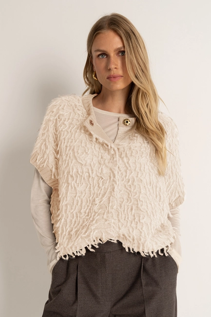 Mouwloos vest met ingebreide franjes