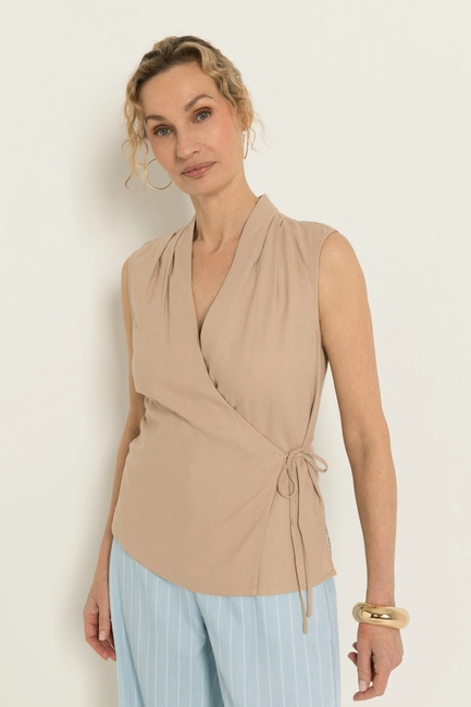 Mouwloze wrap blouse
