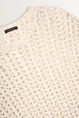 Opengewerkte trui metallic accent