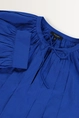 Pofmouwblouse met plooien