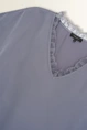 Satijnen blouse met kanten V-hals