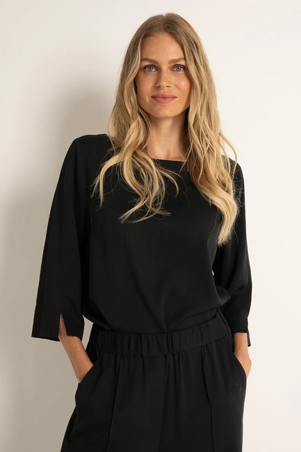 Soepele blouse met splitjes