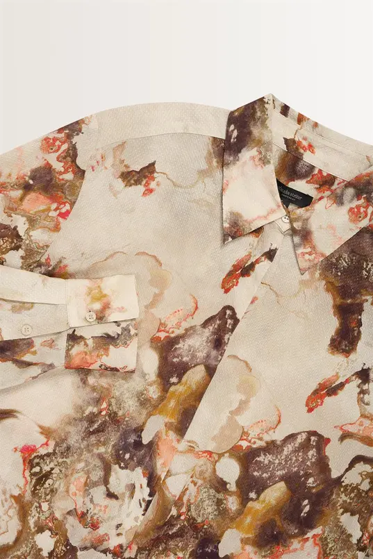Soepelvallende blouse marmerprint