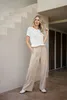 Soepelvallende pantalon met ceintuurlussen