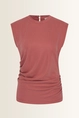 Top met asymmetrische drapering
