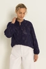 Transparante blouse met borduurstructuur