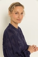 Transparante blouse met borduurstructuur