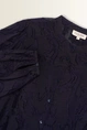 Transparante blouse met borduurstructuur