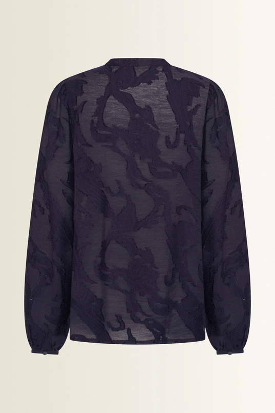 Transparante blouse met borduurstructuur