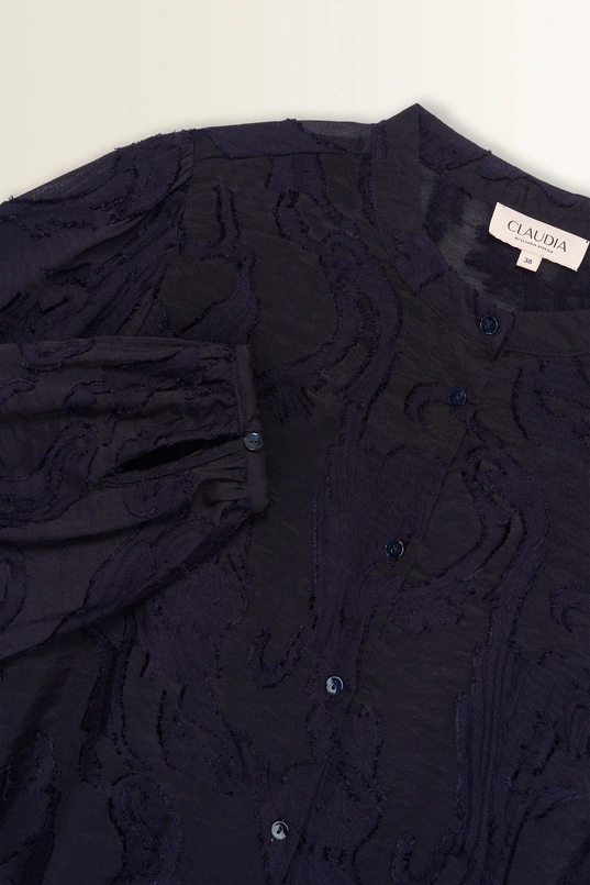 Transparante blouse met borduurstructuur