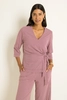 Travel top met overslag en strikdetail