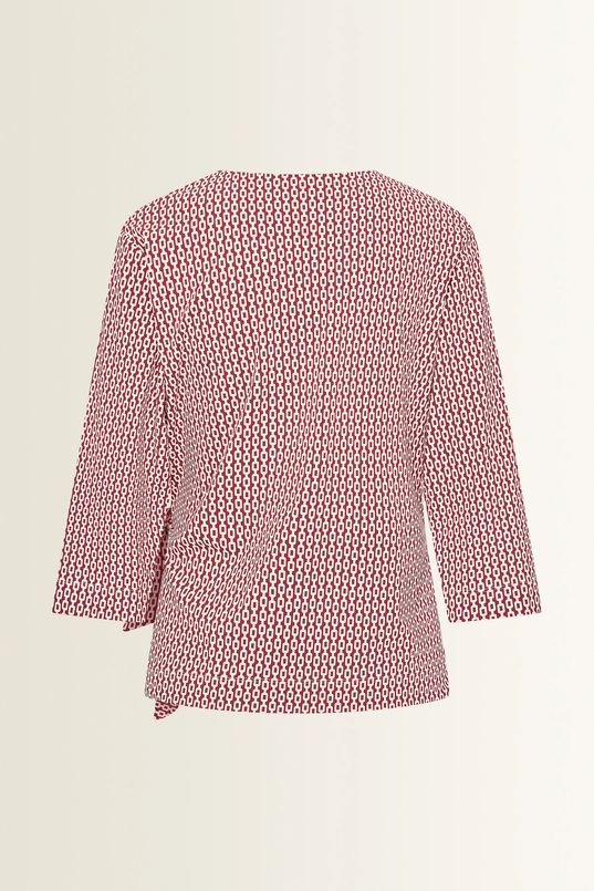 Travel top met overslag en strikdetail