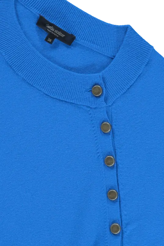 Trui met knoopdetail
